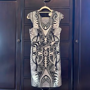 Beautiful day dress. Can accessorize with many colors